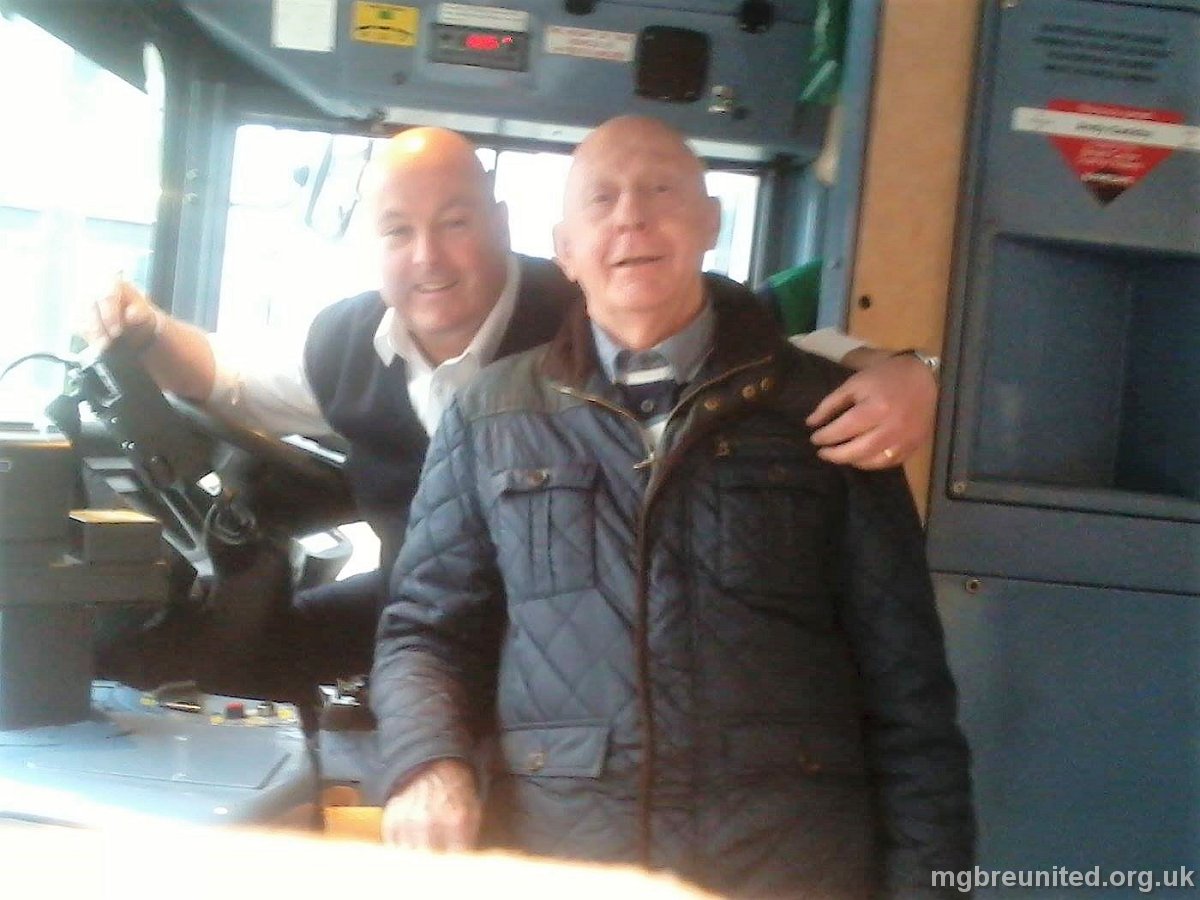 Eddie Short and Mr Mee the PE Teacher Says Eddie Short: Mr Mee (and me!!!) this afternoon in Derby. I'm driving a number 9. An hour round trip from Derby to Ockbrook village. I only do one of those a day. The 1.05 pm from Derby. Taken / posted on Facebook 13 November 2014.