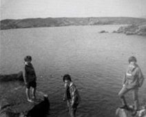 Glen Affric, Scotland 1963 Judith Taylor, Hilary Hulme, Jennifer Laing? Having a paddle in the Cullins, Isle of Skye. Photo from Hilary Hulme