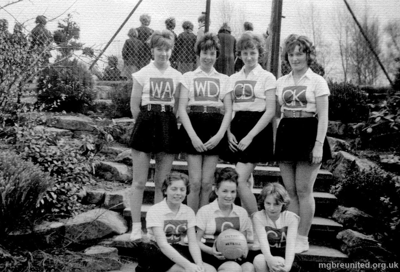 1962 04 Netball Team TOP ROW: Susan De-Barr, Hilary Hulme, Norma Drew, Carole Eggleton. FRONT ROW: Carole Smith, Anita Hopewell, Judith Taylor. Location: Netball courts MGB. April 1962.