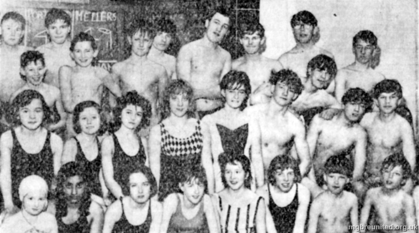 1963 Swimming Gala at Noel Street Baths BACK TWO ROWS: 7 Peter Bradsha? (head to one side), 8 Kevin Whitt, 9 Philip Dewey? (Specs), dk boy leaning forward. 10 dk 2nd ROW: 1 Vicky Moore, 3 Suzanne Eaton, 4 Veronica Wysocki, 5 dk, 6 Patrick Elvin FRONT ROW: 2 Balbir Chelley, 5 Pam McClure, 6 Joy Reavill,