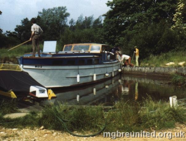 Turning the Boat Capt. Andy Batty with Barrie Evans and Andy Carter - Broads 1972