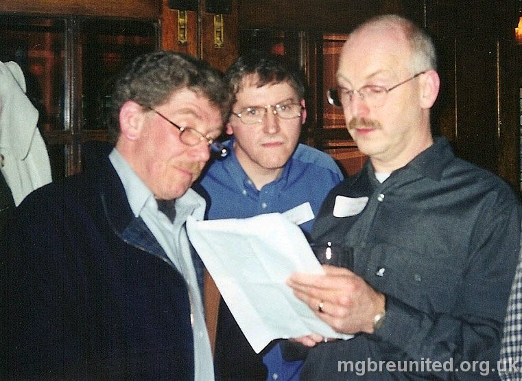 Margaret Glen-Bott Reunion Feb 1999 Don Press, John Simpson and Barrie Evans Trying to read the small print.
